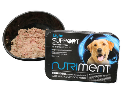 Nutriment Just Tripe raw dog food with washed tripe and turkey formula in black bowl and packaging